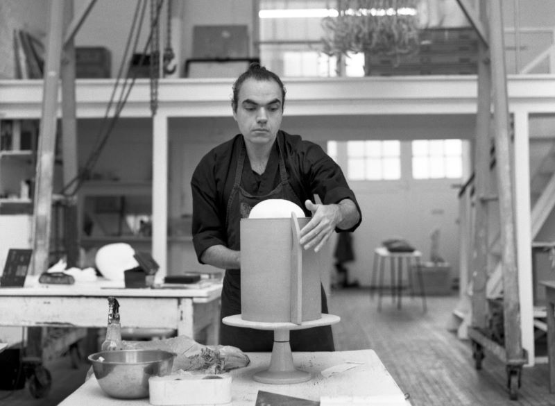 Shahpour Pouyan working in his studio
