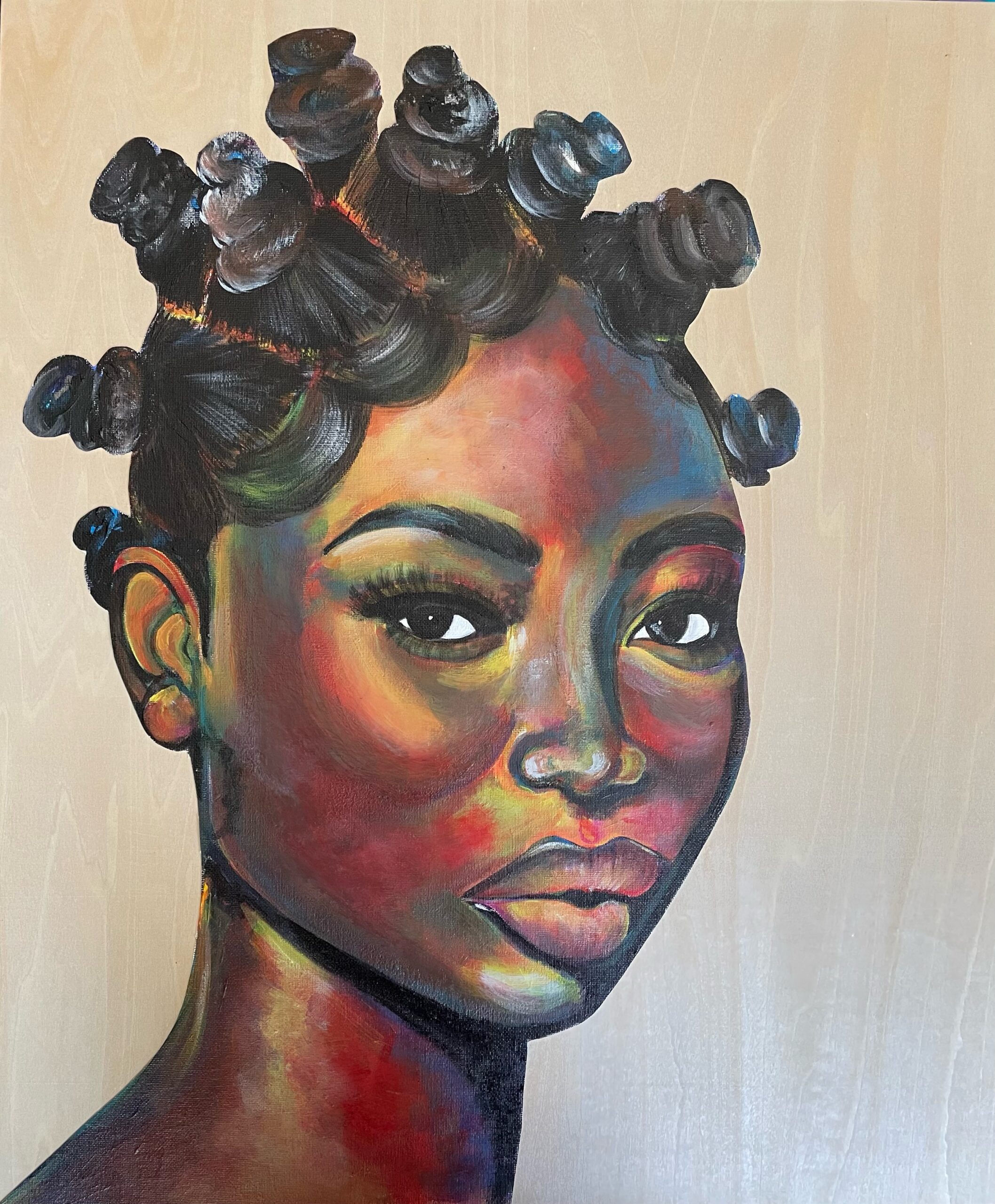 A portrait of a black woman showcases her facial features and detailed Bantu knots hairstyle