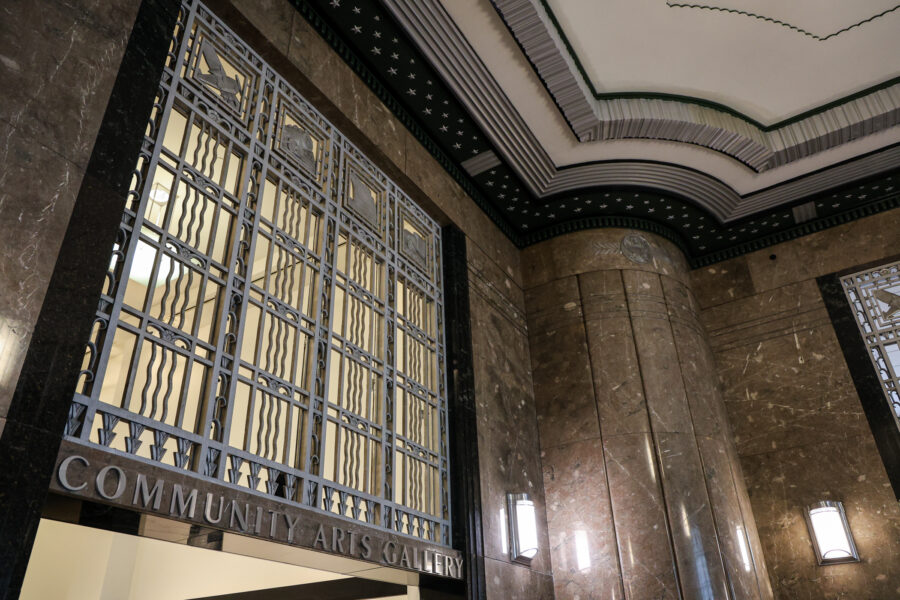 Metal grate and a portion of the scalloped ceiling in the lobby of the Frist