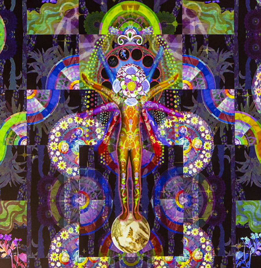 Kaleidoscope type image with human shaped figure in the center surrounded by many vibrant colors and shapes