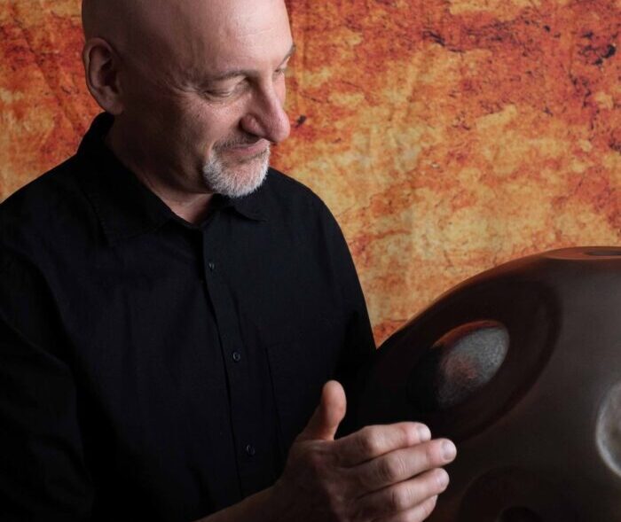 Musician, Bobby Frank, plays the handpan