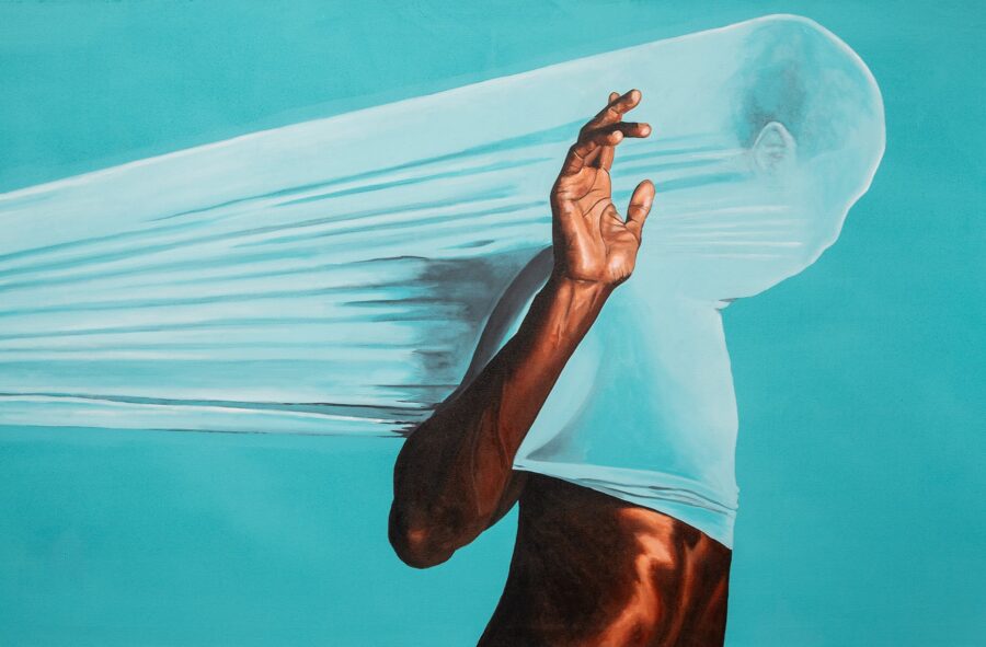 Black shirtless man facing right with a mesh material pulled over his face and chest on a light turquoise background