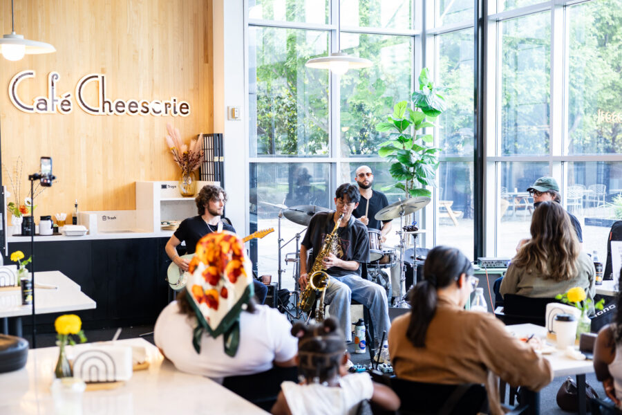 A jazz band performs in a cafe.
