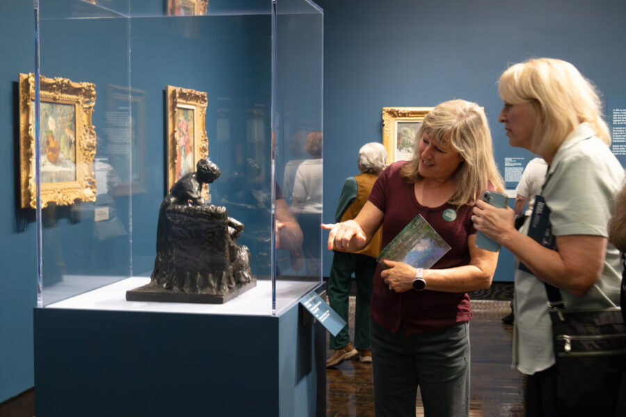 Guest looking at an Impressionist sculpture.