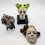 A series of surreal mask vases.