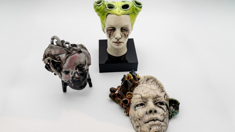 A series of surreal mask vases.