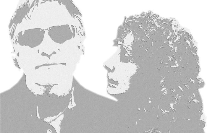 A pixelated image two men in a band.