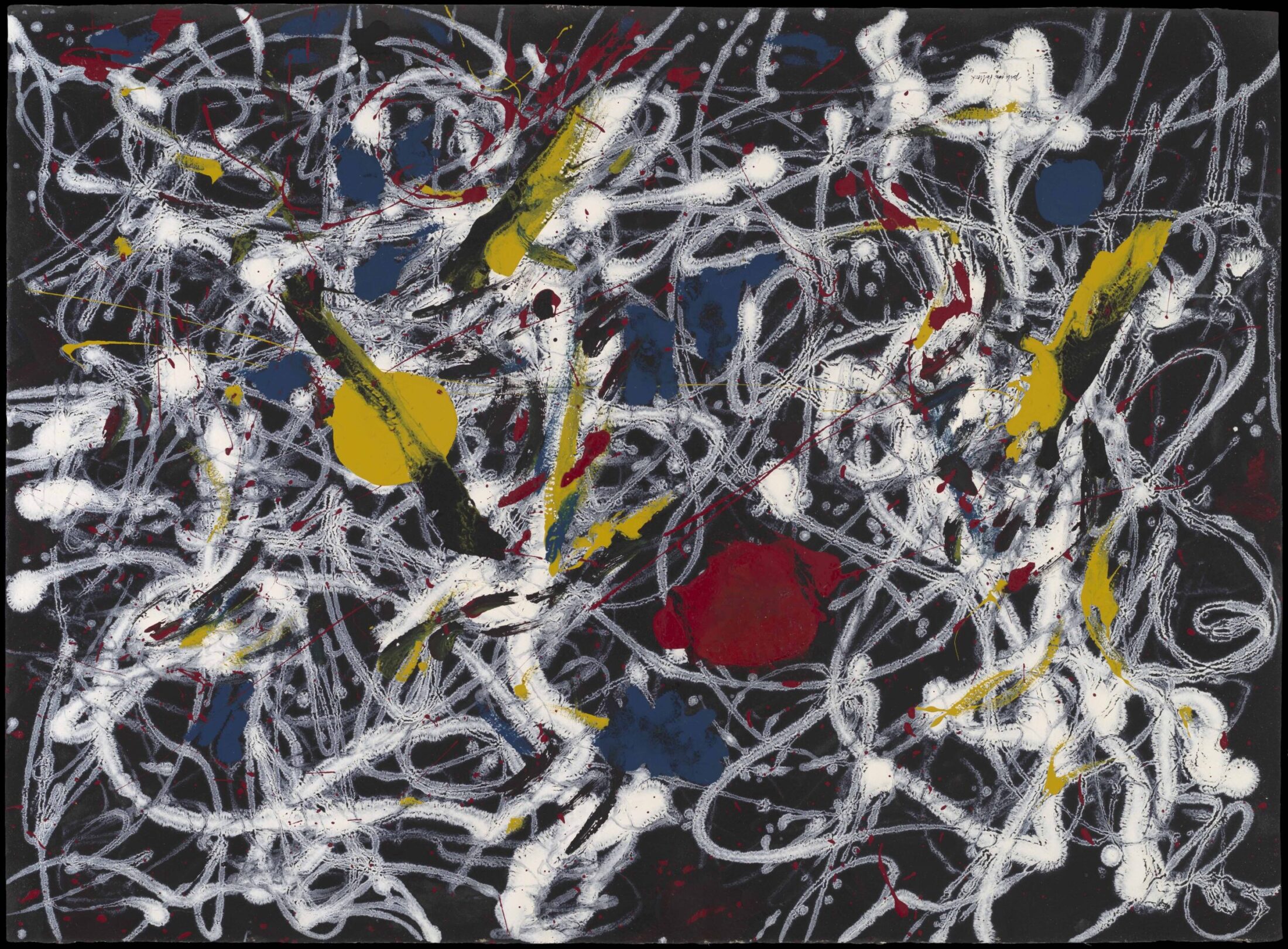 An abstract painting with splattered paint in the colors white, yellow, red, and blue.