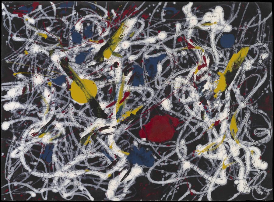 An abstract painting with splattered paint in the colors white, yellow, red, and blue.