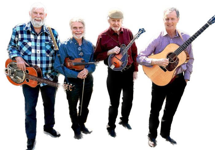 Four members of the Contrarian Ensemble standing and holding their instruments