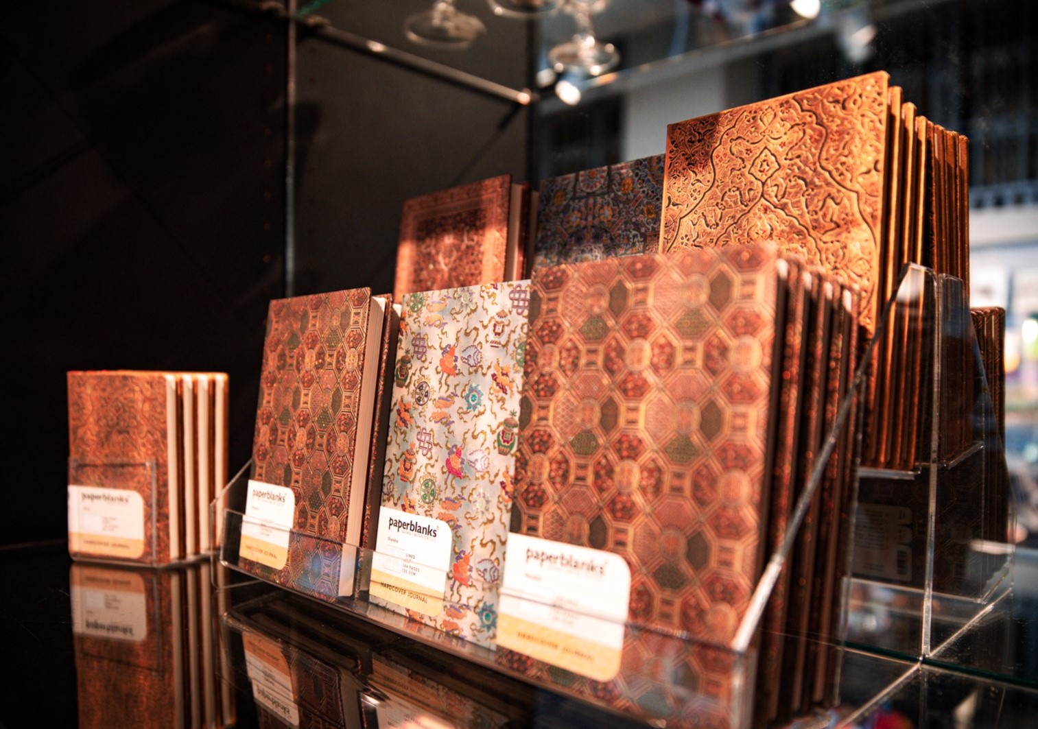 Display of journals with gold patterned covers