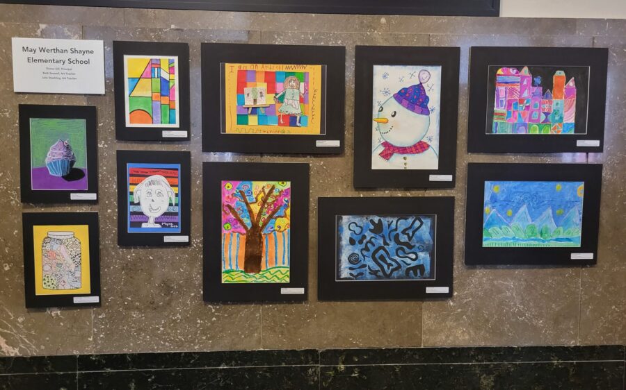 Ten works of art made by elementary students on a wall