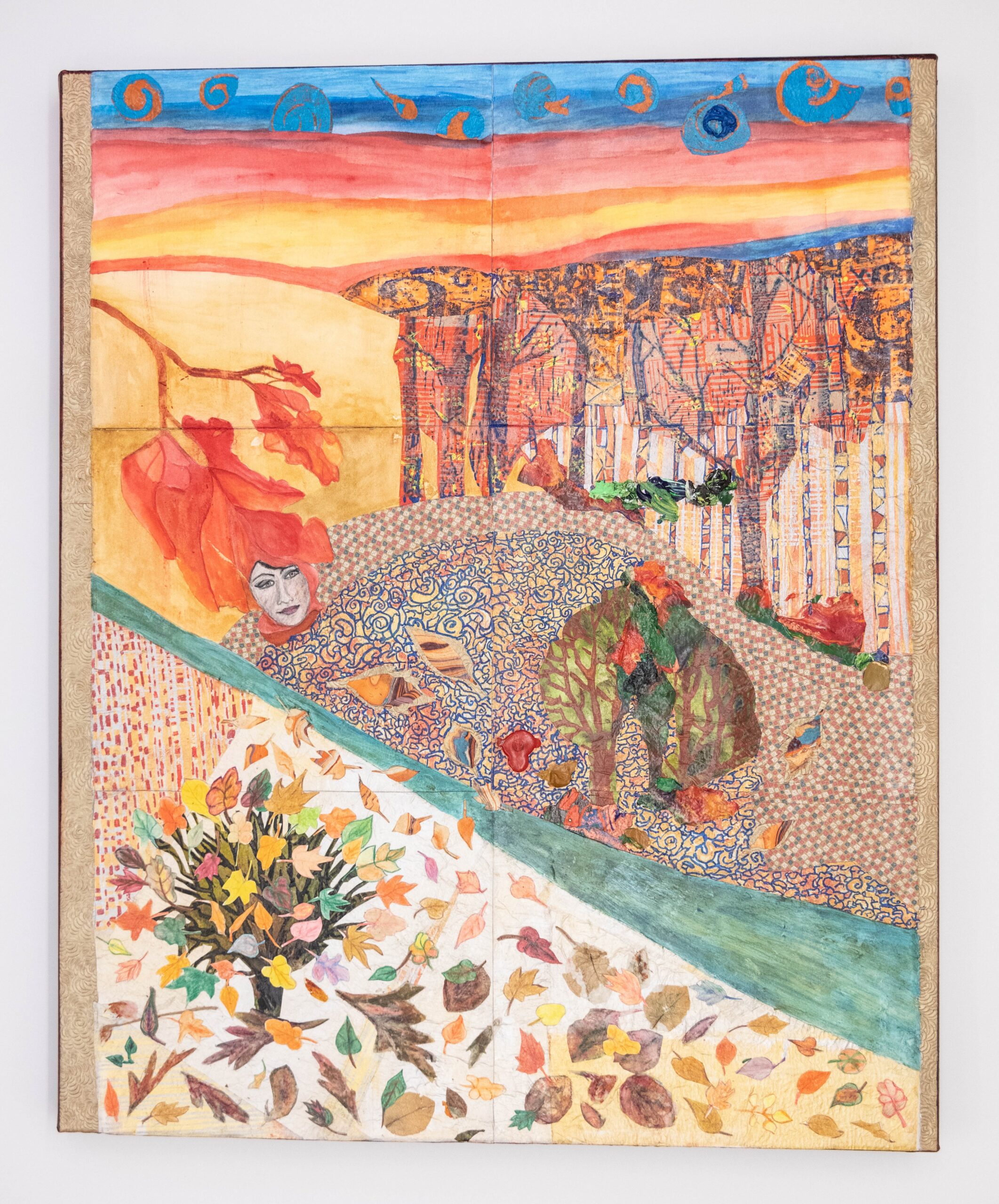 Colorful somewhat abstract painting of a landscape showing trees with falling laves and a woman's face appearing in one of the larger leaves