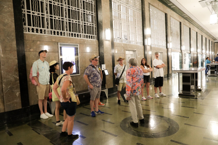 Tour guide talking to tour group in the Frist's Grand Lobby