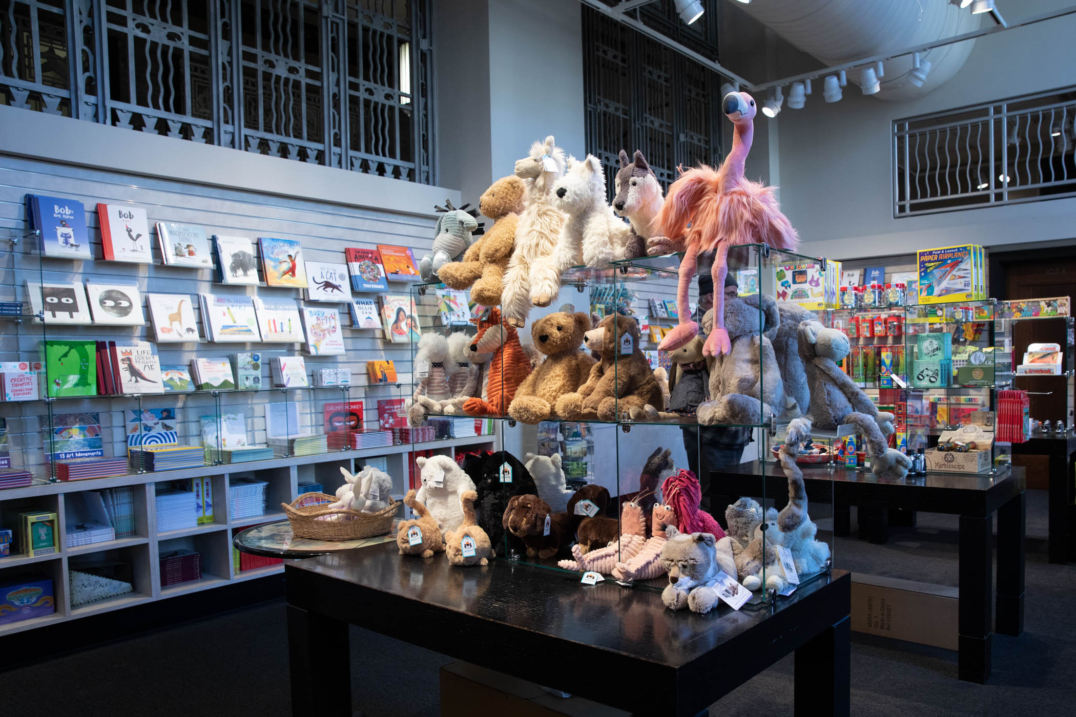 Wide shot of a large shelf with an assortment of stuffed animals