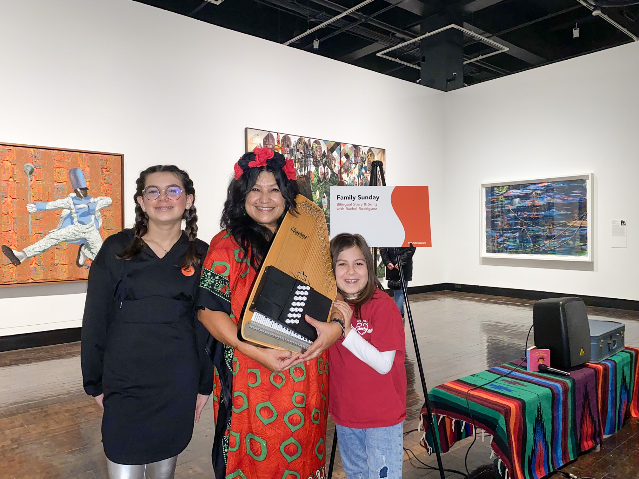 Rachel Rodriguez and two young girls in the galleries.