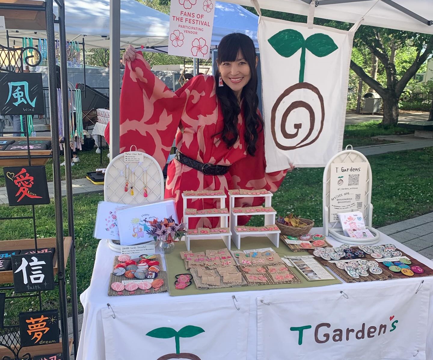 Woman working at a T Gardens booth
